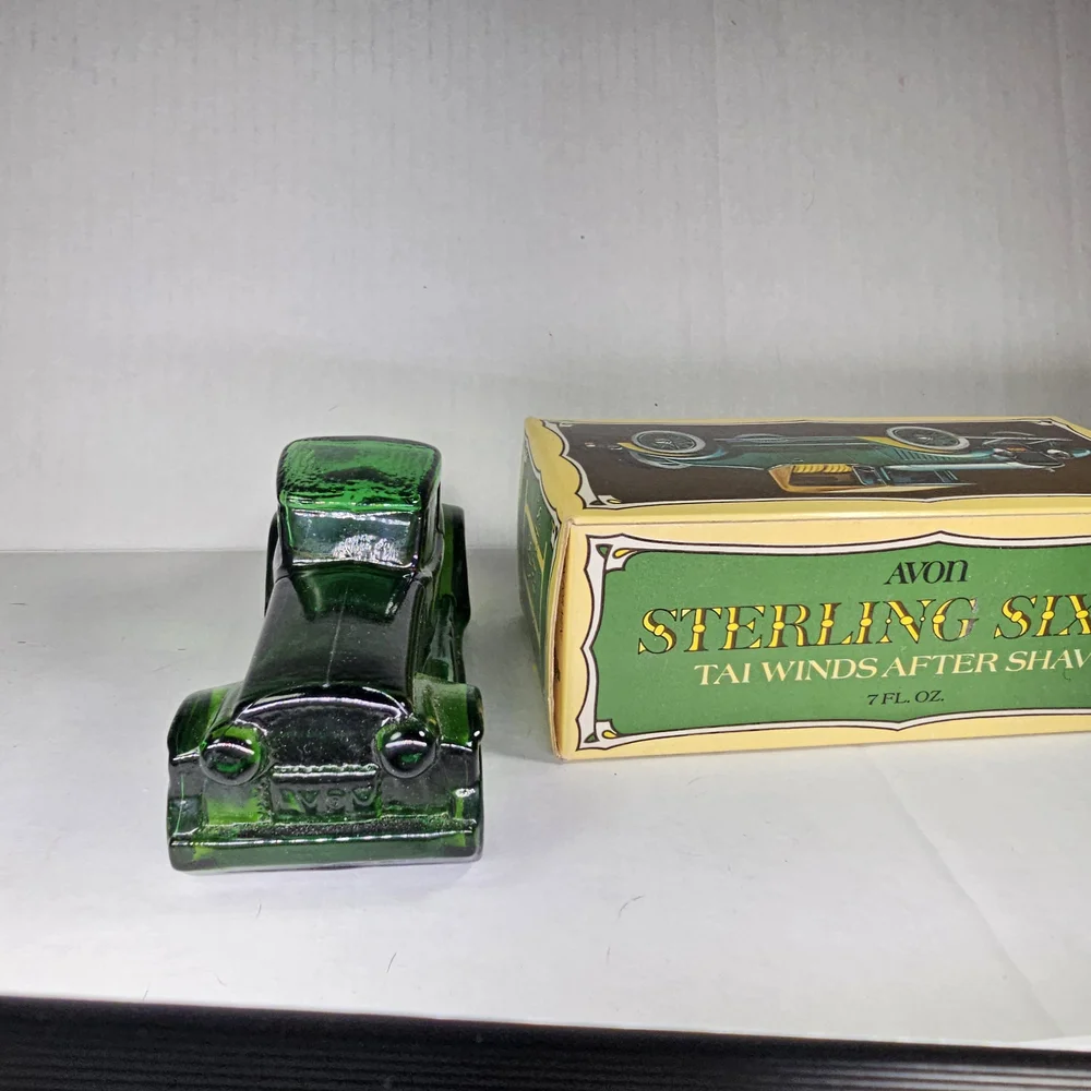 Avon Sterling Six II Green Glass Car Bottle